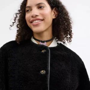 Manteau en mouton retourné duveteux