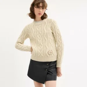 Pull col ras du cou en tricot torsadé