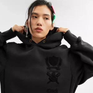 Robe à capuche et écusson exclusif en coton biologique