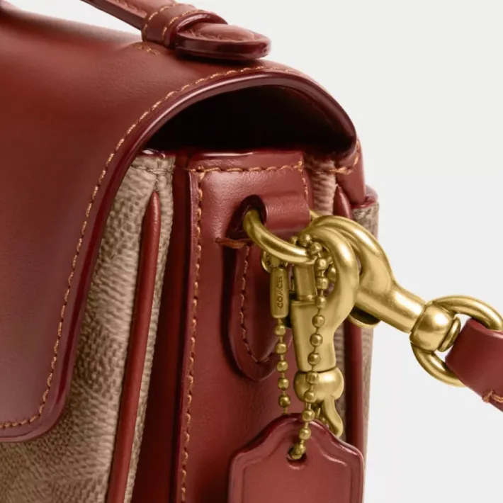 Sac bandoulière Cassie 17 en toile exclusive