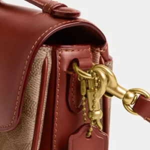 Sac bandoulière Cassie 17 en toile exclusive
