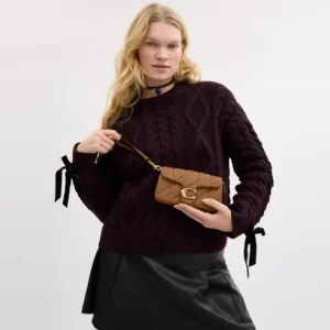 Wristlet à bandoulière Tabby avec matelassage coussiné